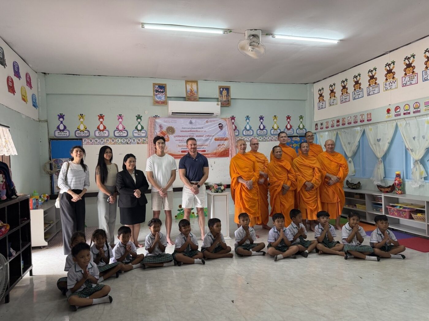 Spirit Bright, Monk Duke and the monastic community with students in the new air-conditioned classroom